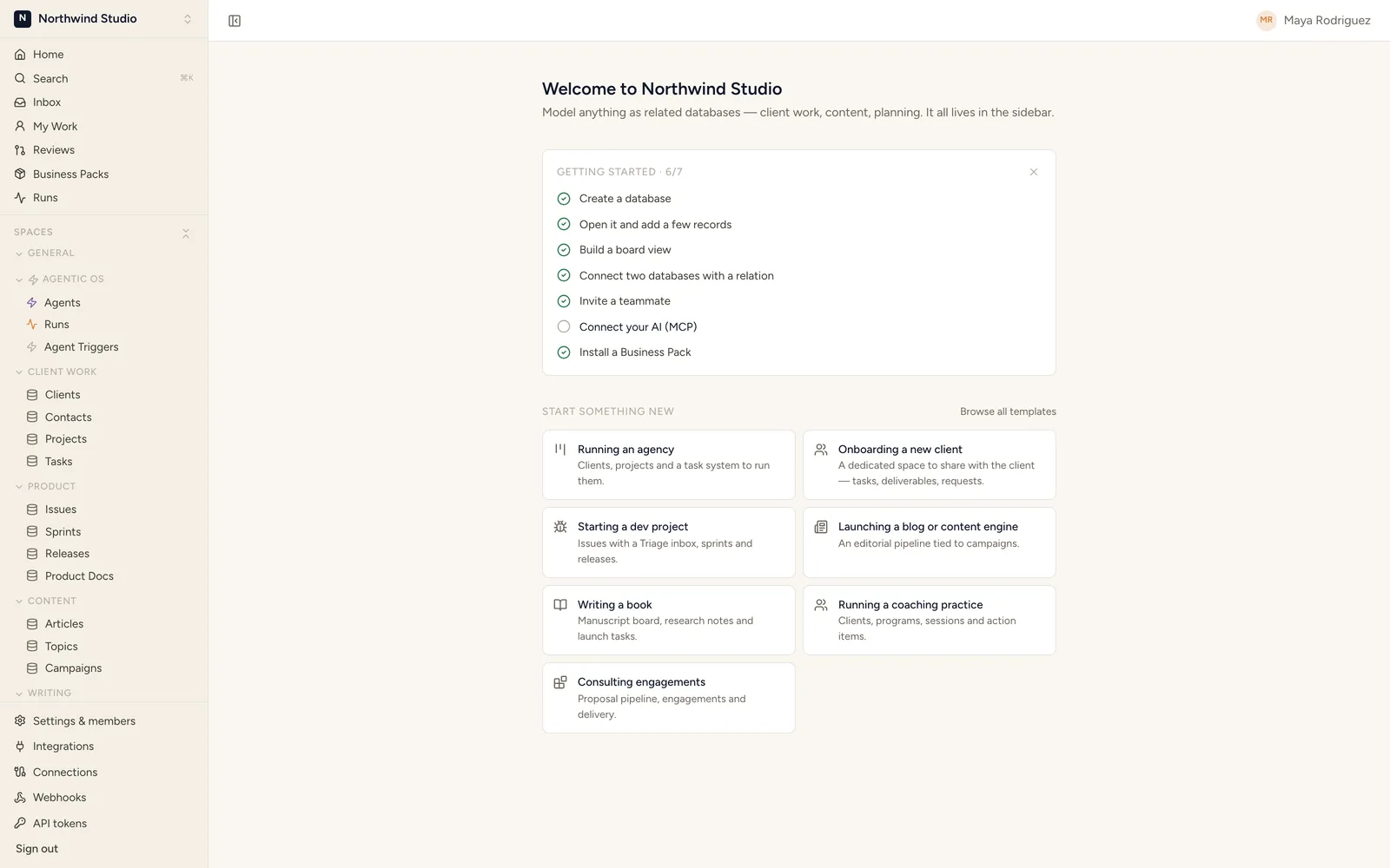 A StoryOS workspace home showing connected spaces and databases — clients, projects, content, sales